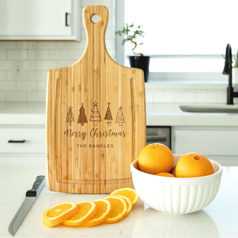 https://www.qualtry.com/cdn/shop/products/staged_JuiceGrooveCuttingBoard_MerryChristmasTrees_800x.jpg?v=1666265300