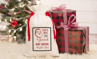 Personalized Red Ribbon Santa Gift Bags – Santa’s Workshop Collection